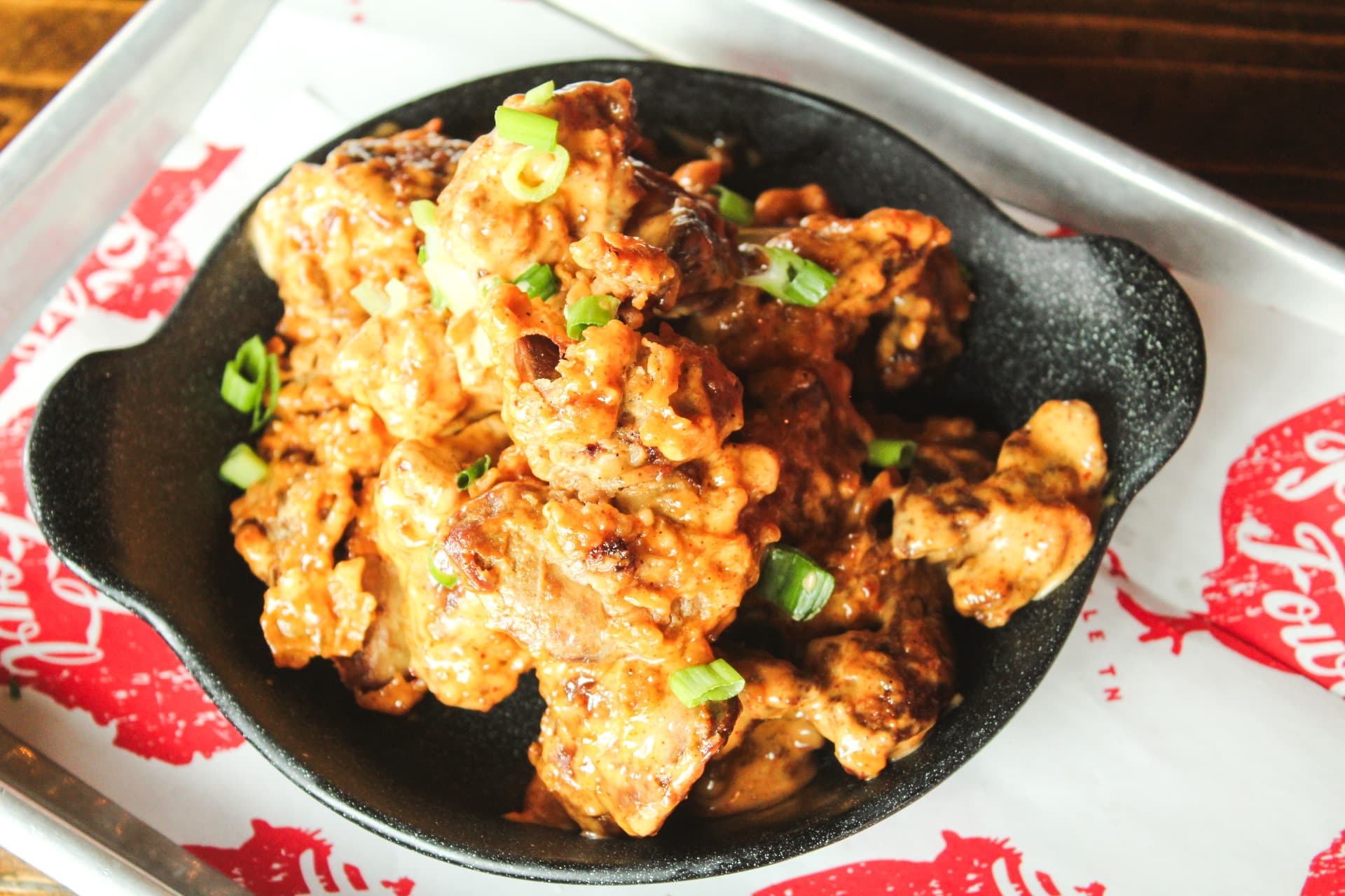 Chicken Liver Bam Bam A savory dish featuring chicken liver garnished with green onions